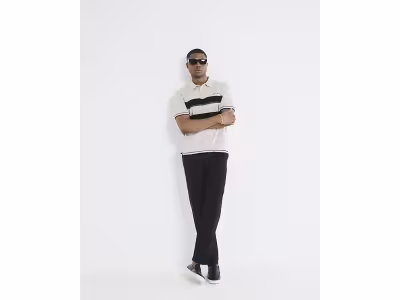 Polo crème bouclé à blocs de couleur