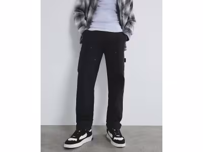 Jean de charpentier noir à jambe droite
