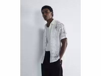 Polo blanc slim fit à motif floral au crochet