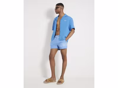 Short de bain bleu à enfiler et motif graphique Luminis